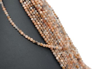 Brown, white and grey moonstones with facets