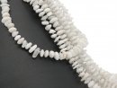 Shimmering, pierced, white moonstone discs