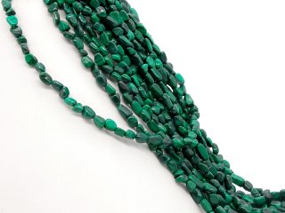 Durchbohrte, grüne Malachite