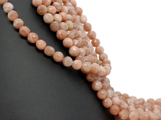 Facettierte, durchbohrte, braune Mondsteine