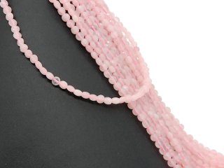 Disques de quartz rose percés, en vrac, rose pastel