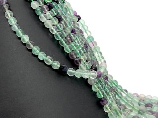 Pierced, violet and green fluorites with facets