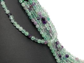 Pierced, violet and green fluorites with facets