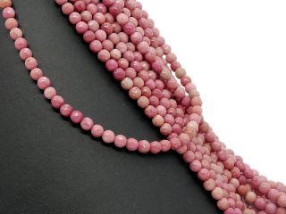 Rhodonite percée à facettes rose et sable