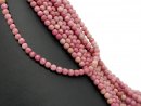 Rhodonite percée à facettes rose et sable