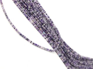 Pierced, purple-coloured, square fluorite discs