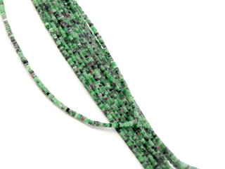 Square Anyolit discs in black, magenta and green