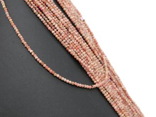 Small, faceted, pierced rhodochrosite beads