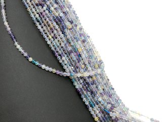 Pierced, violet, green and yellow fluorites with facets