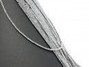 Pierced, silver-coloured, faceted hematite rondelles
