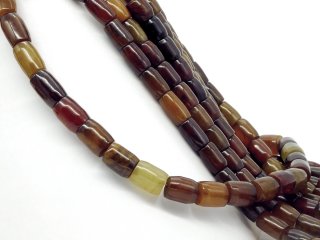 Pierced agate barrels in warm colours