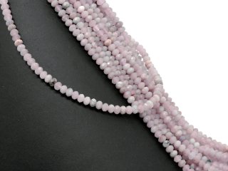 Pierced, loose rose quartz rondelle in pink and grey