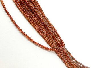 Red pierced garnet balls