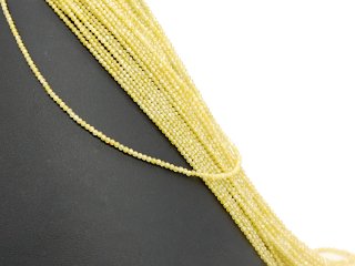 Boules de zircon jaune percées et facettées