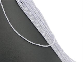 Pierced, purple, faceted zircon beads