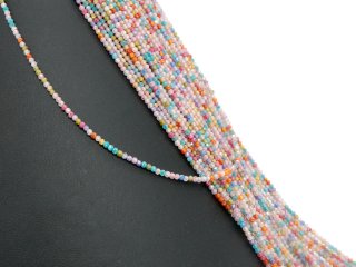 Boules de zirconium percées, facettées et multicolores