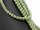 Green, pierced shell pearl beads