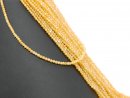 Pierced, yellow, faceted zircon beads