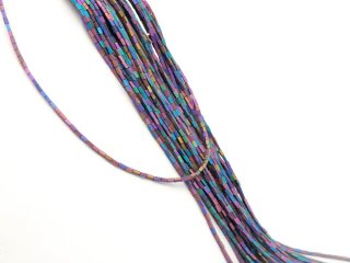 Bâtons dhématite percés et colorés
