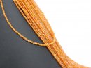 Boules de zircon orange percées et facettées