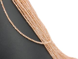 Boules de zirconium percées, facettées et de couleur brun rosé