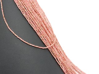 Small, faceted, pierced rhodochrosite beads