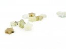 Four green serpentine stars, pierced