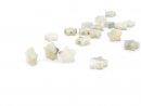 Four pierced, bright amazonite stars