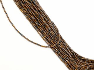 Small, golden tiger eye beads with facets