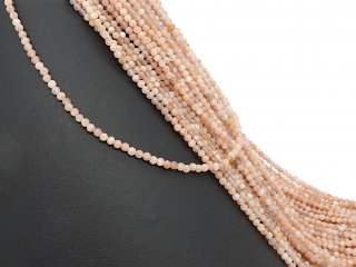 Faceted, pierced, pink-coloured moonstones
