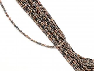 Rhodonite percée à facettes rose et brun