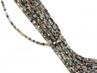 Pierres précieuses mélangées, multicolores, percées de facettes