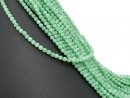 Pierced, faceted angelite beads in green