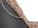 Brown, white and grey moonstones with facets
