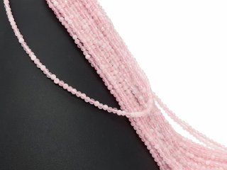 Pierced, faceted rose quartz sphere
