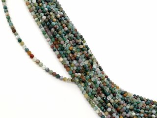 Colourful, faceted, pierced moss agate spheres