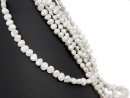 Pierced, baroque, small cultured pearls in white