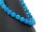 Blue, faceted, pierced agate spheres