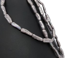 Iridescent, pierced biwa beads