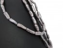 Iridescent, pierced biwa beads