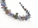 Iridescent, pierced biwa beads