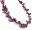 Iridescent, pierced biwa beads