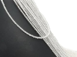 Petites perles de cristal de roche percées