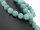 Pierced quartzite spheres with blue facets