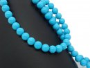 Pierced, sky-blue howlite beads