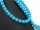 Pierced, sky-blue howlite beads