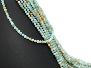 Faceted, ice-blue, pierced amazonite beads
