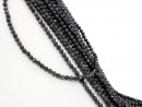 Faceted, pierced, dark sapphire beads