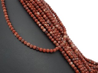 Brick red, pierced, faceted jasper beads