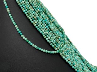 Facettierte, durchbohrte, grüne Türkiskugeln